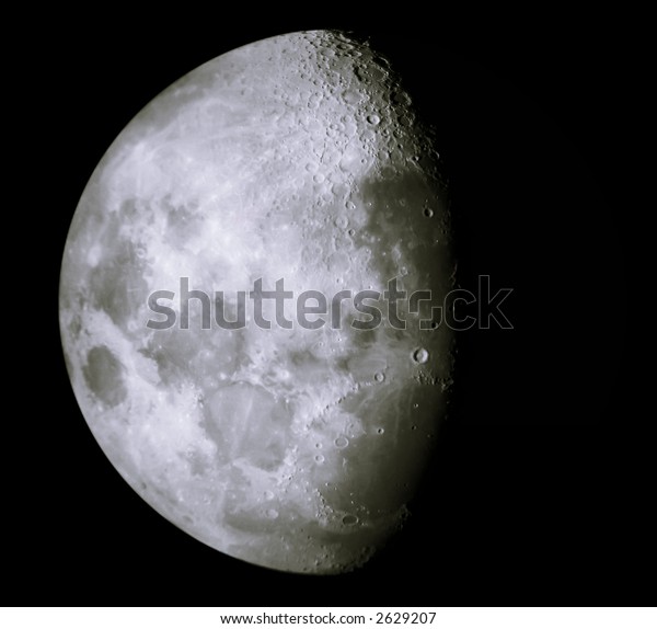 growing moon\
showing details of lunar\
surface