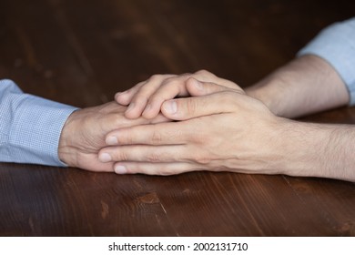 Grown Son Comforting, Consoling Mature Father At Difficult Moment Of Health Problem, Depression, Grief, Memory Loss. Nurse, Caregiver Holding Hand Of Older Patient. Family, Compassion Concept. Close