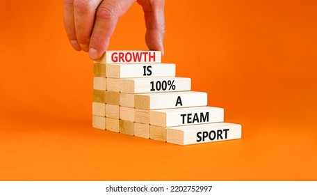 Growth Symbol. Concept Words Growth Is 100 Percent A Team Sport On Wooden Blocks On A Beautiful Orange Table Orange Background. Businessman Hand. Business Motivational Growth Is A Team Sport Concept.