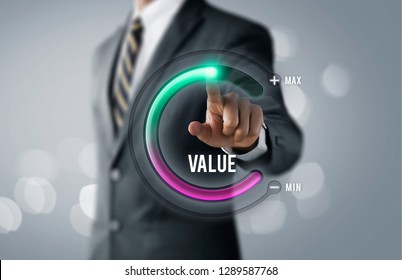 Growth Value, Increase Value, Value Added Or Business Growth Concept. Businessman Is Pulling Up Circle Progress Bar With The Word VALUE On Bright Tone Background.