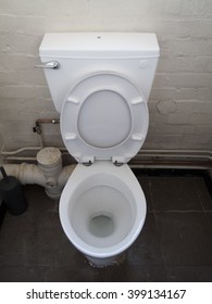 Grubby Toilet With Lid And Seat Up