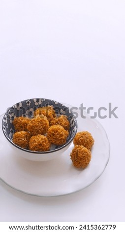 Grubi or kremes is traditional snack from sweet potato and brown sugar, served in bowl.

 Zdjęcia stock © 