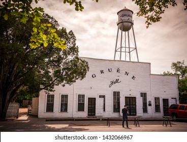 Gruene, Texas / USA - April 11 2019: Famous Western Dance Hall With Water Tower In Background. 