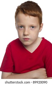 Grumpy boy looking at camera.  Room for text.