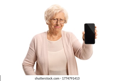 Grumpy Elderly Woman Showing A Mobile Phone Isolated On White Background