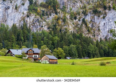 GRUNDLSEE, AUSTRIA - The outside of buildings in rural Austria during the summer. Clicks can be seen in the distance. - Shutterstock ID 342834569