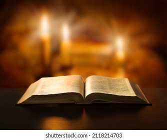 Grunge age dirty rough rustic brown psalm pray torah law letter archiv stack dark black wooden desk table space. New jew culture god Jesus Christ gospel literary art wood still life flame fire concept