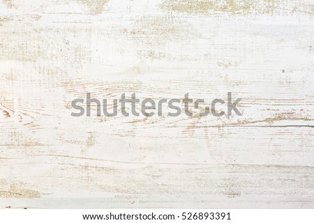 Grunge background. Peeling paint on an old wooden floor.