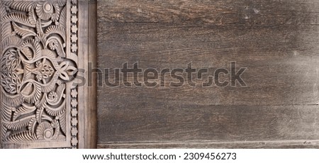 Grunge background with wood texture and ancient carved ornament, Morocco. Horizontal or vertical banner with ornament in Moroccan style. Mock up template. Copy space for text