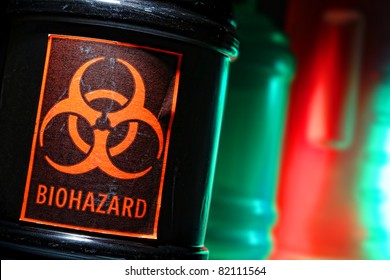 Grunge Biohazard Universal Symbol Danger Warning Label On A Dangerous Toxic Waste Black Container In A Scary Hazardous Material Disposal Site