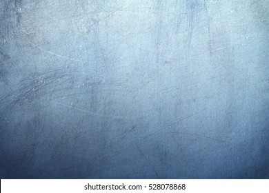 Grunge of blue color paint on steel background