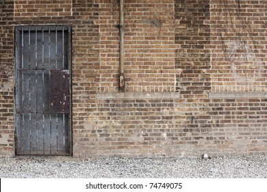 Grunge Brick Wall & Barred Door