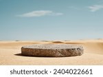 Grunge brown concrete stone above beige beach sand background. mockup platform podium for skin care or cosmetics or products on clear blue sky background  Front view