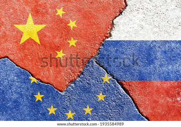Grunge China VS Russia VS EU national flags icon\
on broken weathered dirty concrete wall with cracks background,\
abstract China Russia Europe politics partnership relationship\
conflicts concept