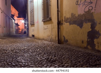 Grunge Dark Alley At Night, Slums Of The City, Squalid Dirty Corner Of Street In The Decadent Old Town
