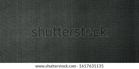grunge dark grey dotted halftone pattern printed on paper useful as a background
