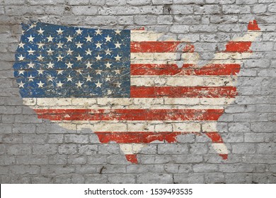 Grunge distressed map shaped flag of USA painted on old weathered grey brick wall
