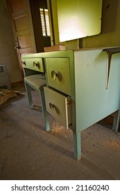 Grunge Dresser In Abandoned Motel Room