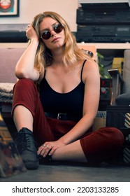 Grunge Fashion, Punk Woman And Rock Hipster, Retro Model And Confident Female With Glasses On Floor. Portrait Of Young Gen Z, Cool Girl And Attitude In Creative Style, Urban Fashion And Trendy Youth