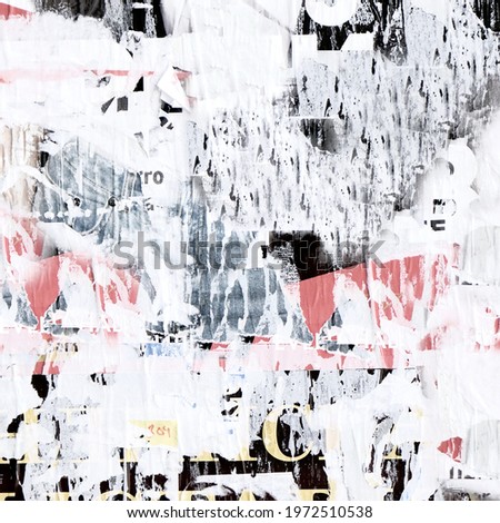 Grunge Frame Background with Old Torn Posters. Urban Graffiti Wall Texture. Old Grunge Ripped Torn Posters and Ads Street Background and Texture. Grungy Urban Wallpaper. Vintage City Billboard.