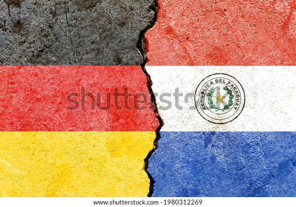 Grunge Germany vs Paraguay national flags\
pattern isolated on broken cracked wall background, abstract\
Germany Paraguay politics relationship friendship divided conflicts\
concept texture\
wallpaper