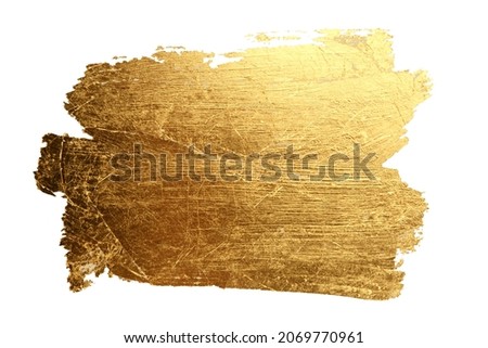 Grunge Gold and bronze glitter color smear grunge painting on white. Abstract glow shiny background. 