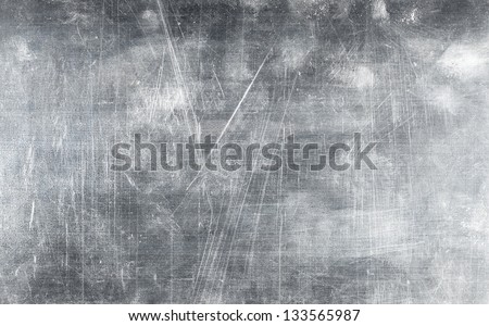 Grunge metal plate texture with screws, background