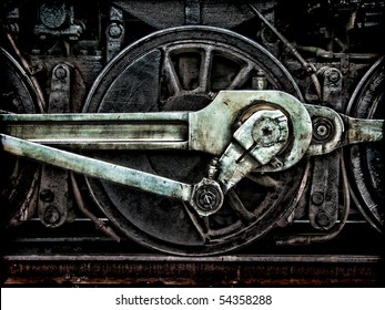 Grunge old steam locomotive wheel and rods