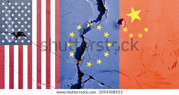 Grunge pattern of US EU\
China vertical national flags isolated on rough broken concrete\
wall with cracks background, abstract international countries\
contrast power concept