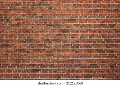Grunge red brick wall background with copy space - Shutterstock ID 212125063