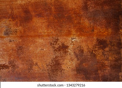 Grunge rusted metal texture. Rusty corrosion and oxidized background. Worn metallic iron panel. Abandoned design wall. Copper bar.