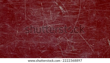 grunge scratched brown red plastic texture useful as a background