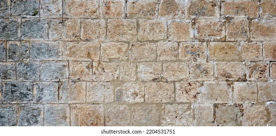 Grunge Stonewall Beautiful  Brickwork Construction  Textured Pattern Background Outdoor Horizontal Photo