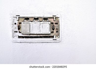 Grunge Switch Panel With Cover Removed On White Concrete Wall, Repair Damaged Old Lighting Control Switch Button