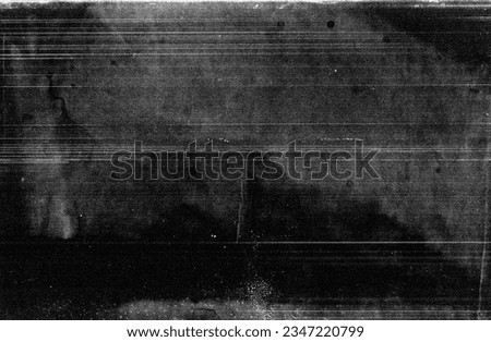 Grunge texture of highly detailed paper. Against a black background, faded stripes in white and gray evoke a sense of wear and age, showing an elegant blend of history and character.