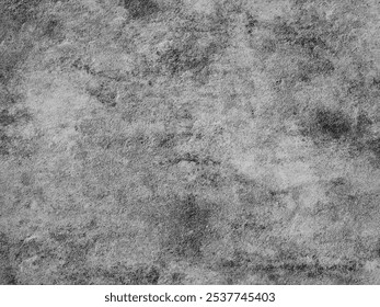 Grunge texture with weathered, worn-out patterns in shades of gray. Black and white grunge texture