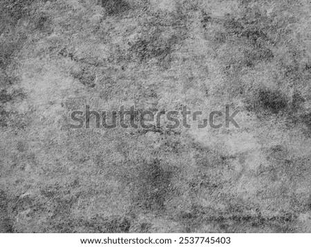 Grunge texture with weathered, worn-out patterns in shades of gray. Black and white grunge texture
