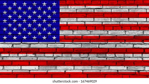  Grunge textured US Flag on brick wall.