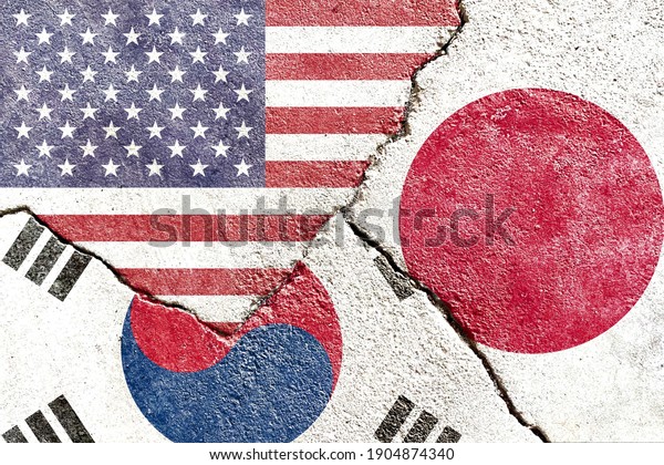 Grunge USA vs Japan vs South Korea national flags\
icon isolated on cracked wall background, abstract US Japan South\
Korea international politics society relationship conflicts concept\
texture