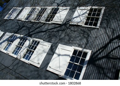 Grunge windows with tree shadows