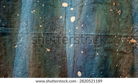 Grungy bleached fabric texture featuring distressed cloth, faded colors, and abstract textile patterns. Worn fibers, weathered details, and rugged fabric surface create a unique vintage background, ideal for graphic design, fashion, textiles, wallpapers, mockups, print materials, creative projects, and artistic texture concepts.