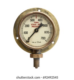 Grungy old brass  air pressure gauge isolated on white background
