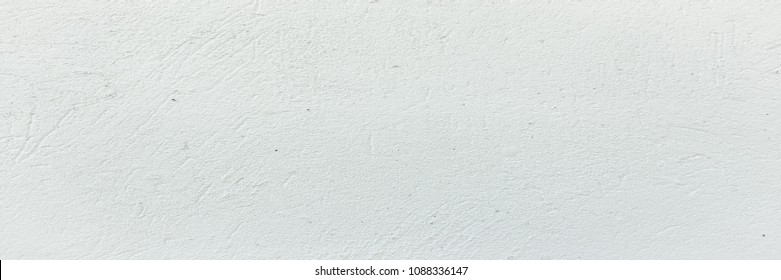 Grungy painted wall texture as background. Cracked concrete vintage floor, old white painted. Background washed painting