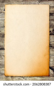 Grungy paper poster mock up PSD on rustic wooden background