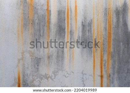 Grungy roung cement wall texture background. Water irosion concreat wall background. 