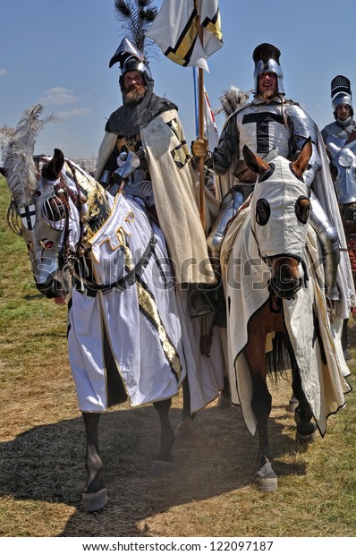 GRUNWALD - JULY 17: Mounted Knights - 600th anniversary Battle of Grunwald 1410. 6000 reenactors,2200 knights,near 200 thousands viewers. July 17, 2010 in Grunwald, Poland.