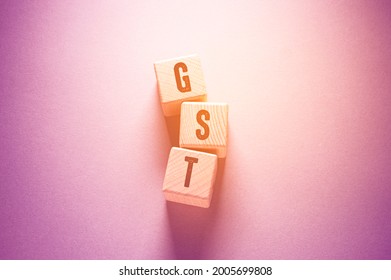 Gst Word Written On Wooden Cubes