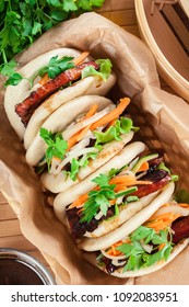 Gua bao, steamed buns with pork belly and vegetable. Asian cuisine. Top view
