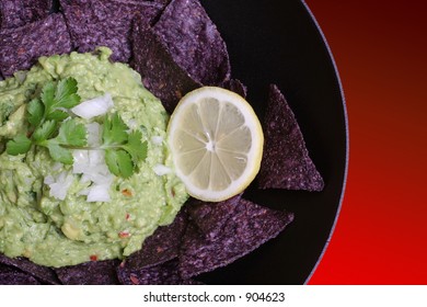 Guacamole With Blue Corn Chips.