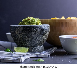 Guacamole, Chips In Wooden Bowl, And Roasted Tomato Salsa